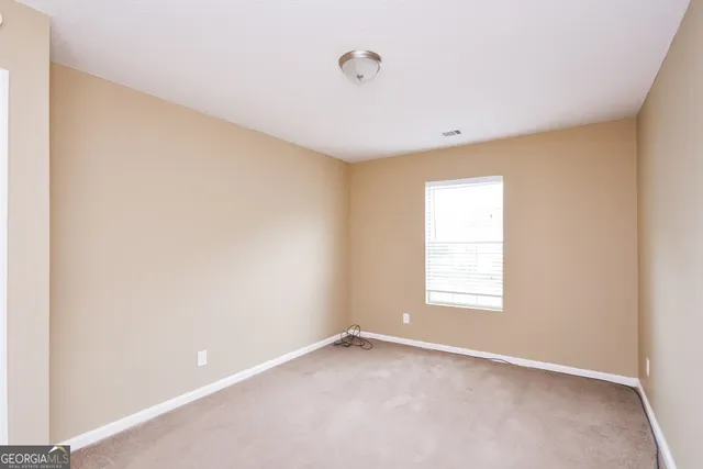 an empty room with a window