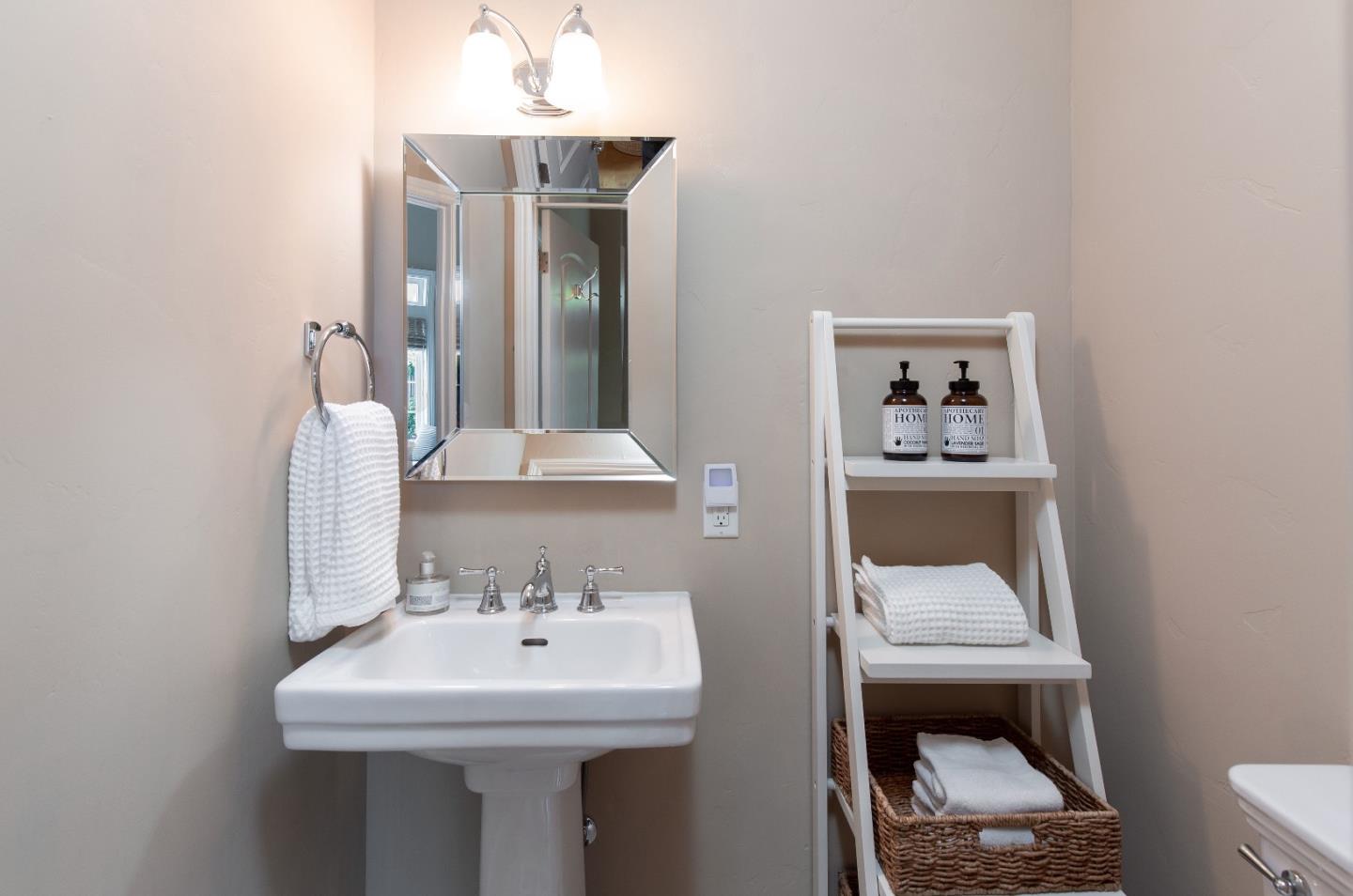 88 Forrest Avenue Los Gatos, CA 95032 - Photo 11 of 26 a bathroom with a sink toilet and a mirror