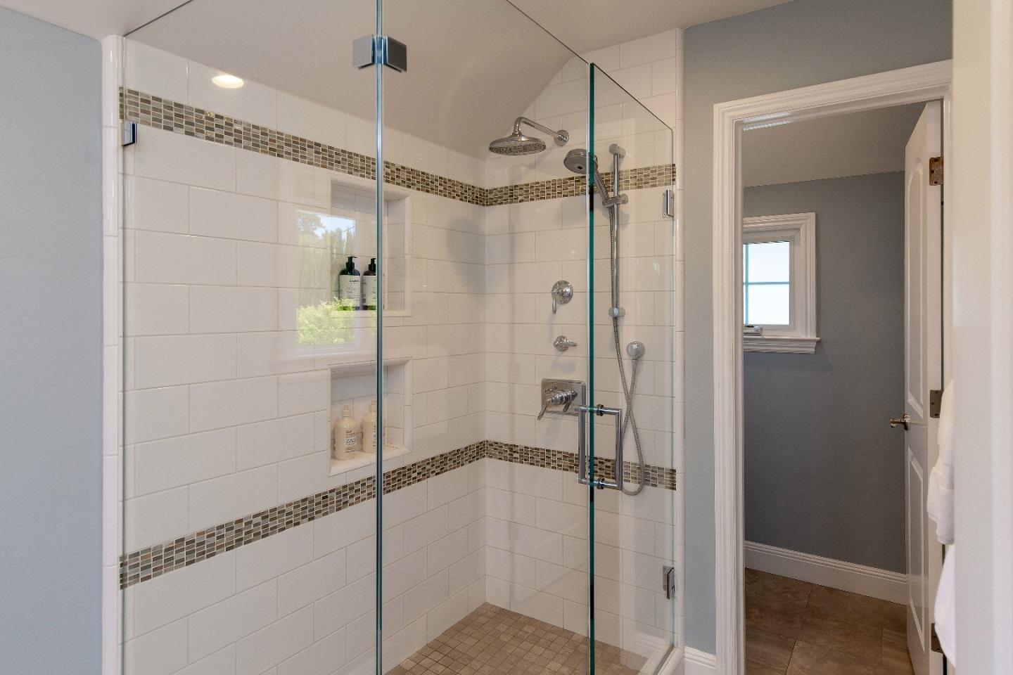 88 Forrest Avenue Los Gatos, CA 95032 - Photo 16 of 26 a bathroom with a glass shower door and a sink