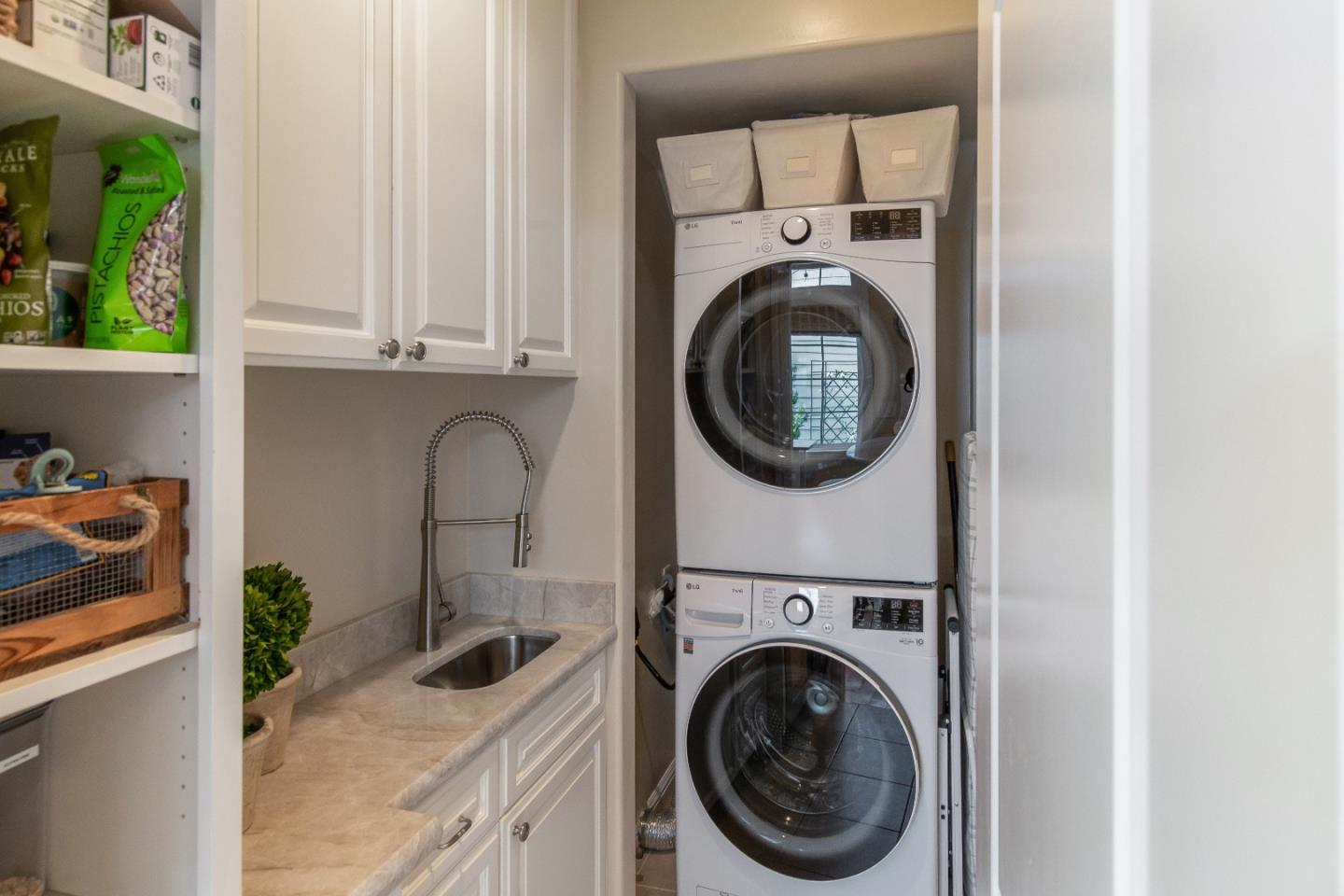 88 Forrest Avenue Los Gatos, CA 95032 - Photo 19 of 26 a utility room with sink dryer and washer