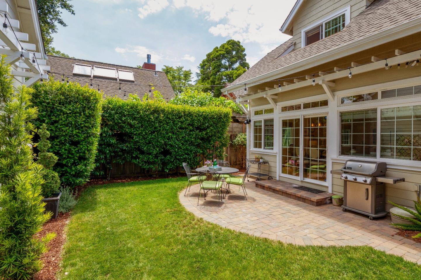 88 Forrest Avenue Los Gatos, CA 95032 - Photo 21 of 26 a view of a chair and table in backyard of the house