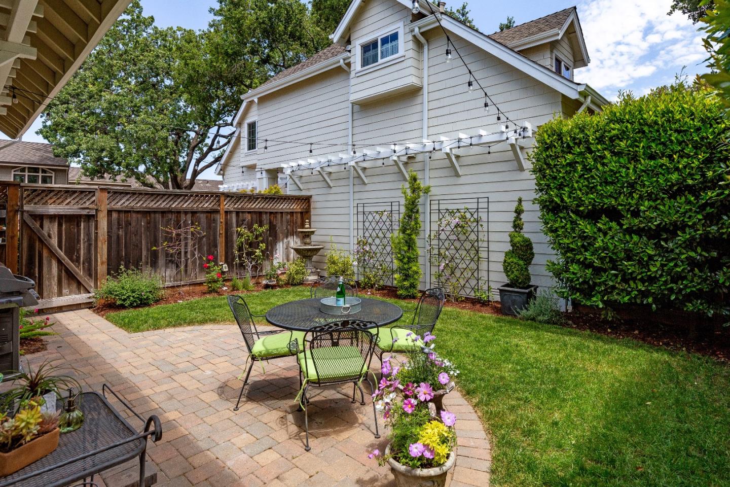 88 Forrest Avenue Los Gatos, CA 95032 - Photo 22 of 26 a view of a chair and table in backyard of the house
