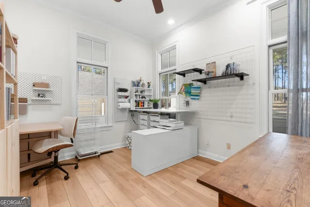 a kitchen with a sink appliances and cabinets