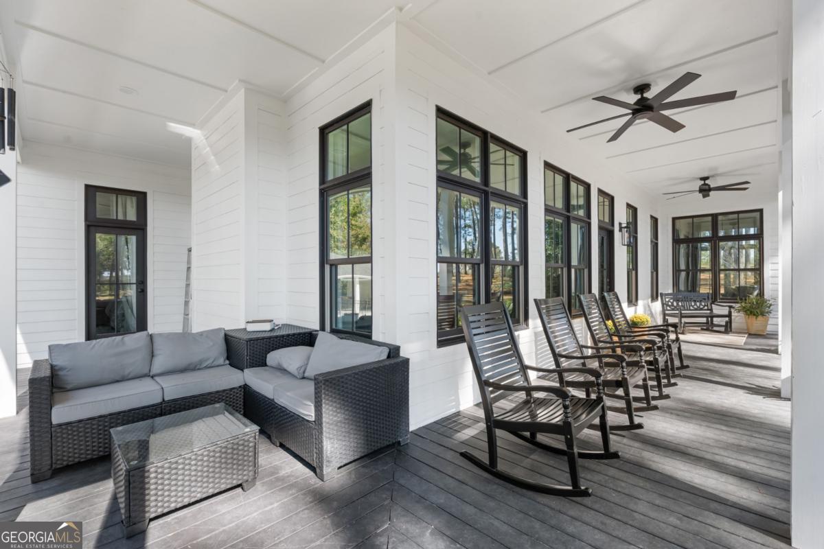 1951 Tru Fail Crossing Road Garfield, GA 30425 - Photo 37 of 49 a living room with furniture and two large window