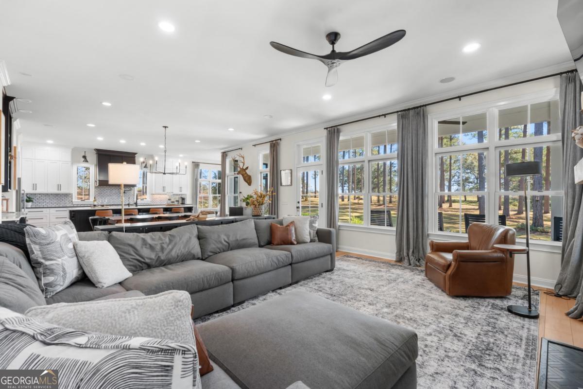 1951 Tru Fail Crossing Road Garfield, GA 30425 - Photo 5 of 49 a living room with furniture and a large window