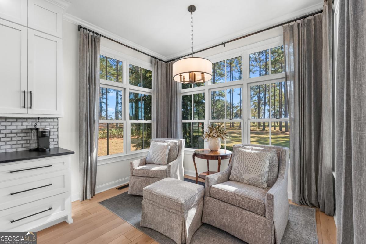 1951 Tru Fail Crossing Road Garfield, GA 30425 - Photo 10 of 49 a living room with furniture and windows
