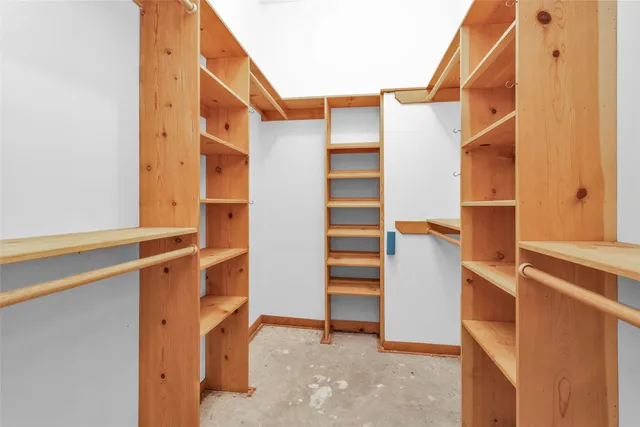 a view of an empty walk in closet