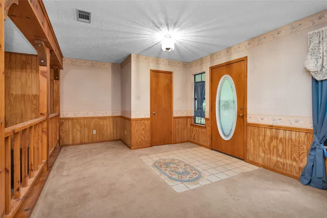 a view of a hallway with painted walls