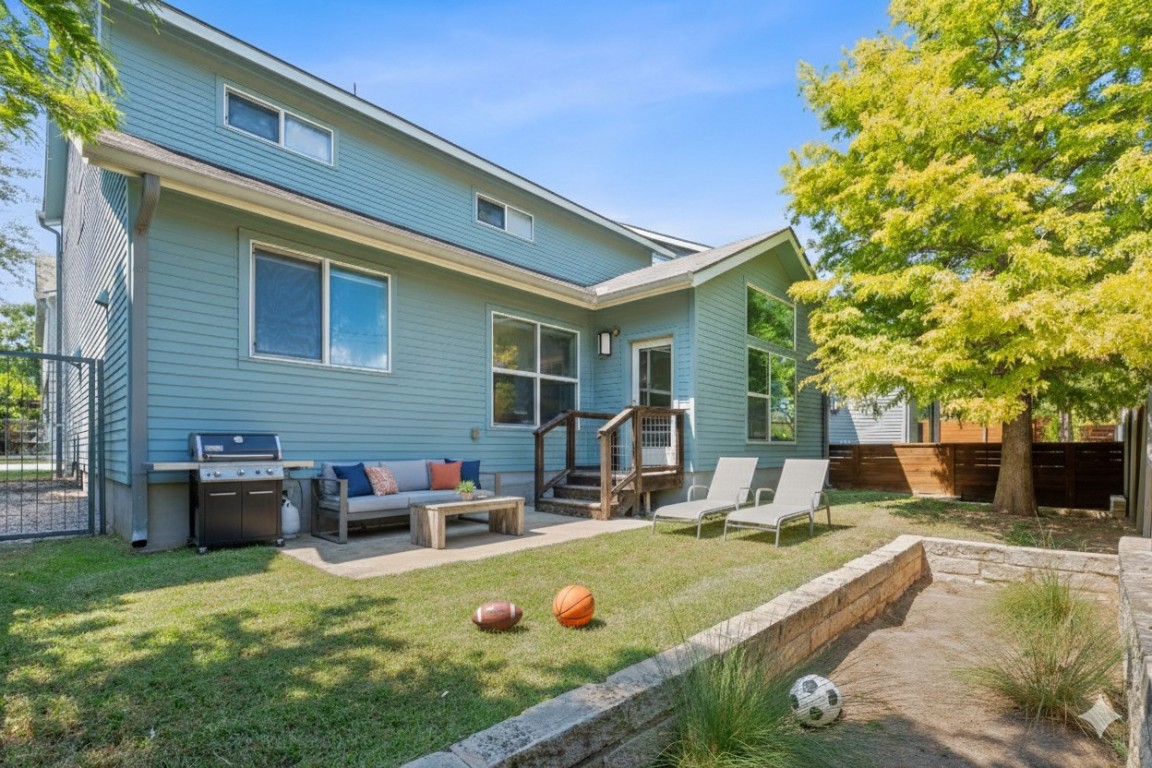 301 West Stassney Lane, Unit 7 Austin, TX 78745 - Photo 27 of 30 a view of a house with backyard and sitting area