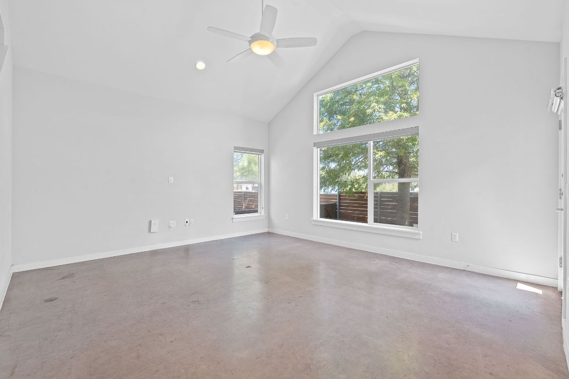 301 West Stassney Lane, Unit 7 Austin, TX 78745 - Photo 5 of 30 an empty room with windows