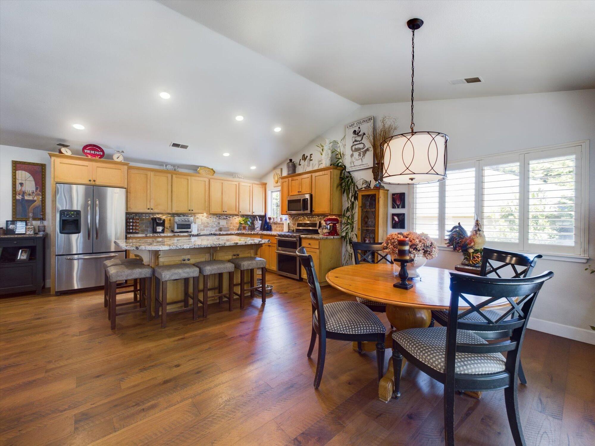 178 Grayland Heights Road Rio Dell, CA 95562 - Photo 12 of 52 a view of a dining room with furniture window and wooden floor