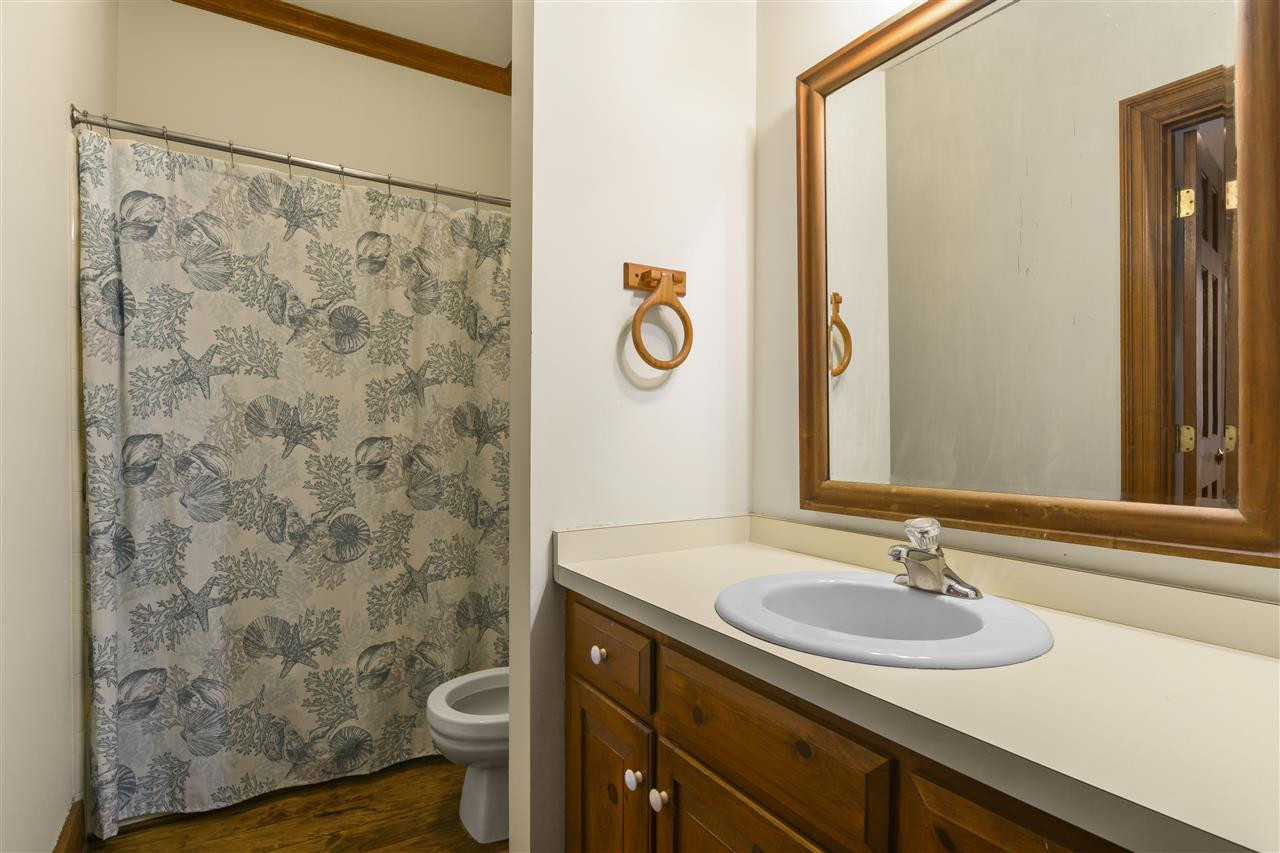 8528 Bournemouth Drive Raleigh, NC 27615 - Photo 15 of 30 The main floor of the home has an easily accessible a full bath. Bathroom