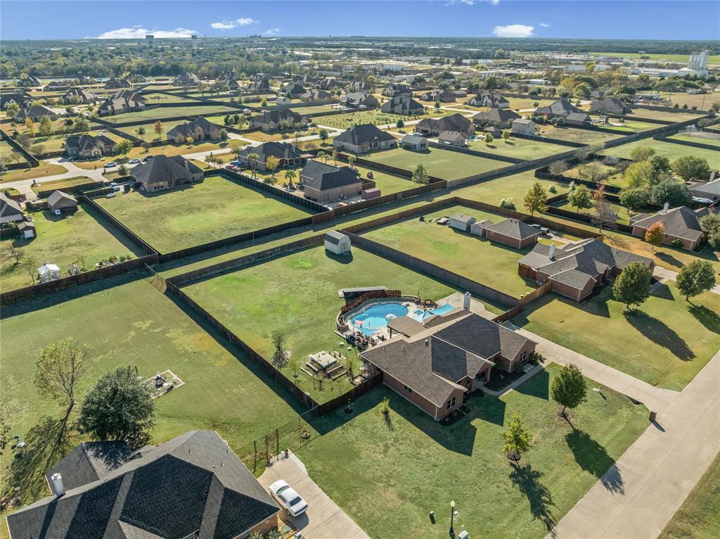 112 Springfield Lane Red Oak, TX 75165 - Photo 38 of 40 an aerial view of residential houses with outdoor space