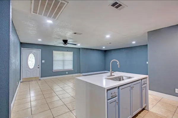 a very nice looking rest room with a large window