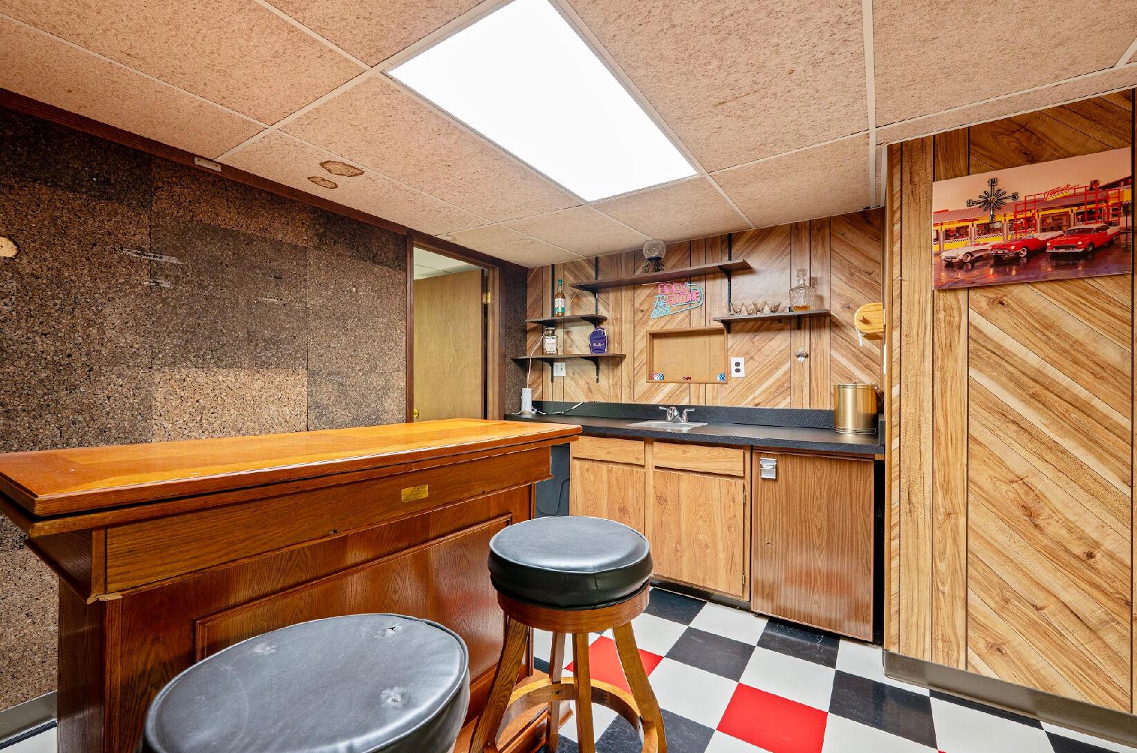 300 Stockbridge Road Columbus, OH 43207 - Photo 22 of 40 The wet bar tops off this finished basement space.