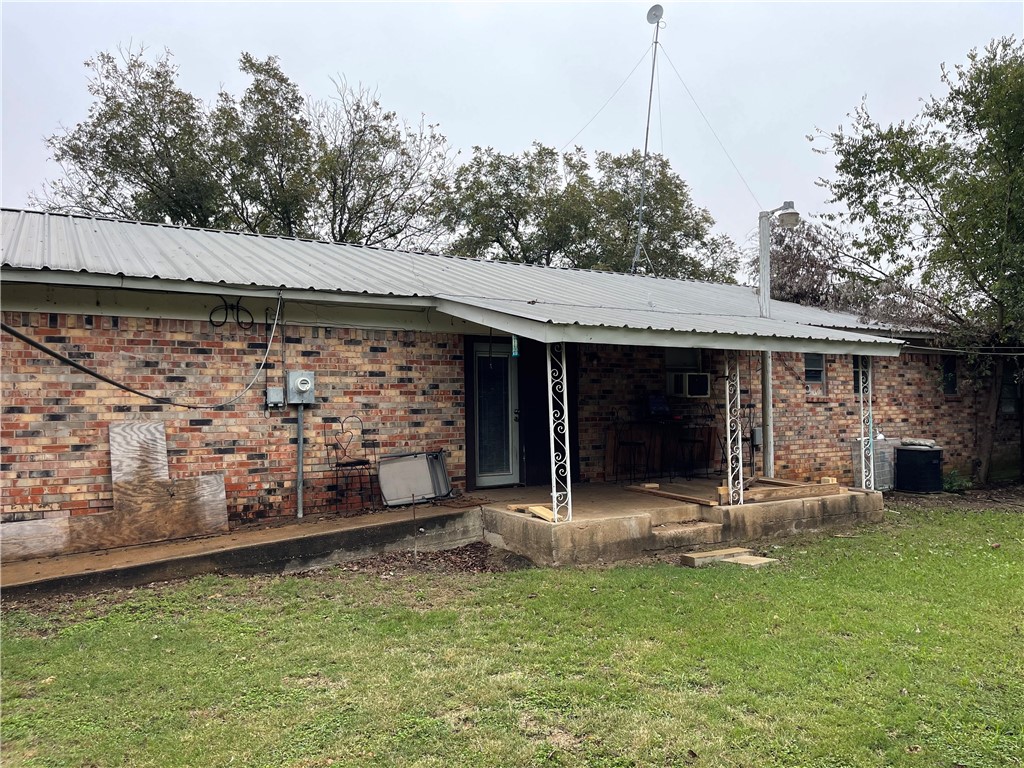 133 Wayman Drive Whitney, TX 76692 - Photo 29 of 38 a front view of a house with a yard