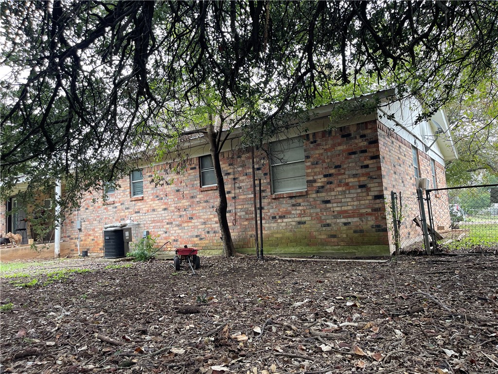 133 Wayman Drive Whitney, TX 76692 - Photo 32 of 38 a view of a backyard