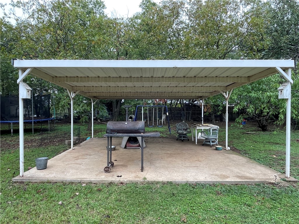 133 Wayman Drive Whitney, TX 76692 - Photo 34 of 38 a view of a chair and table in the garden