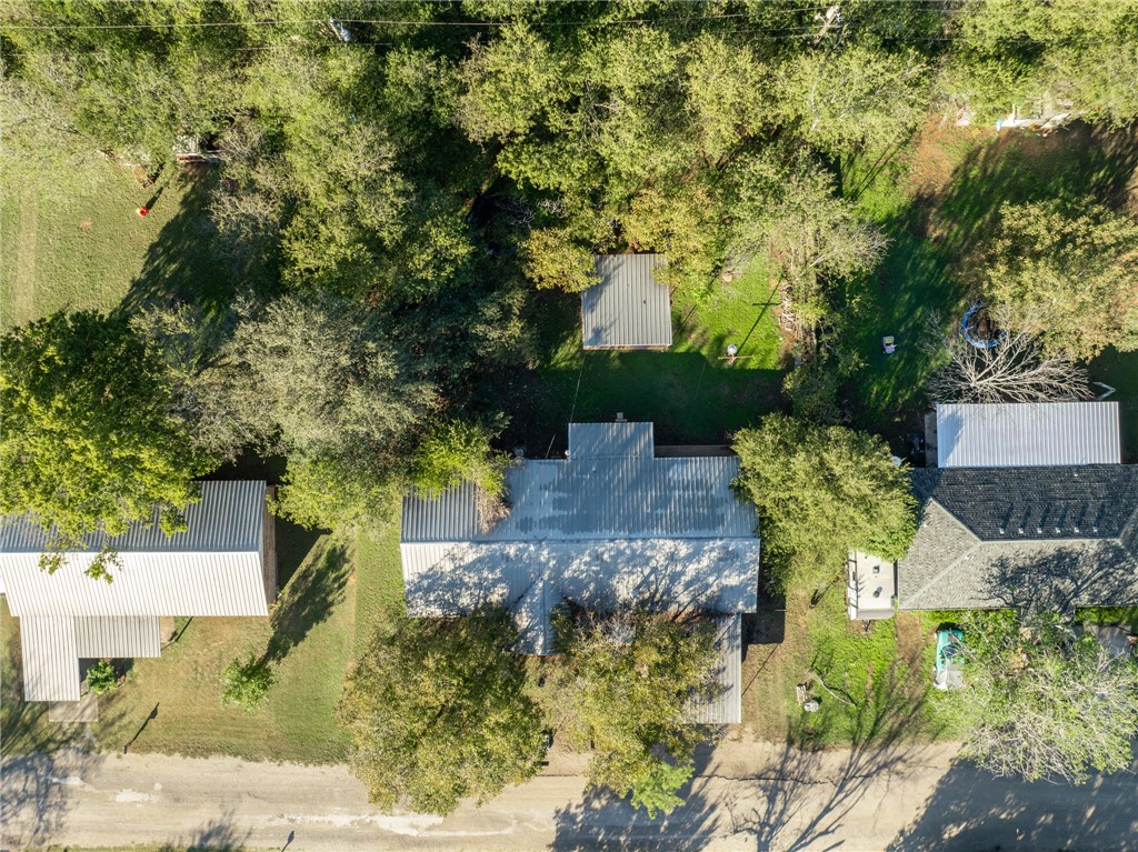 133 Wayman Drive Whitney, TX 76692 - Photo 36 of 38 an aerial view of a house with a yard basket ball court and outdoor seating