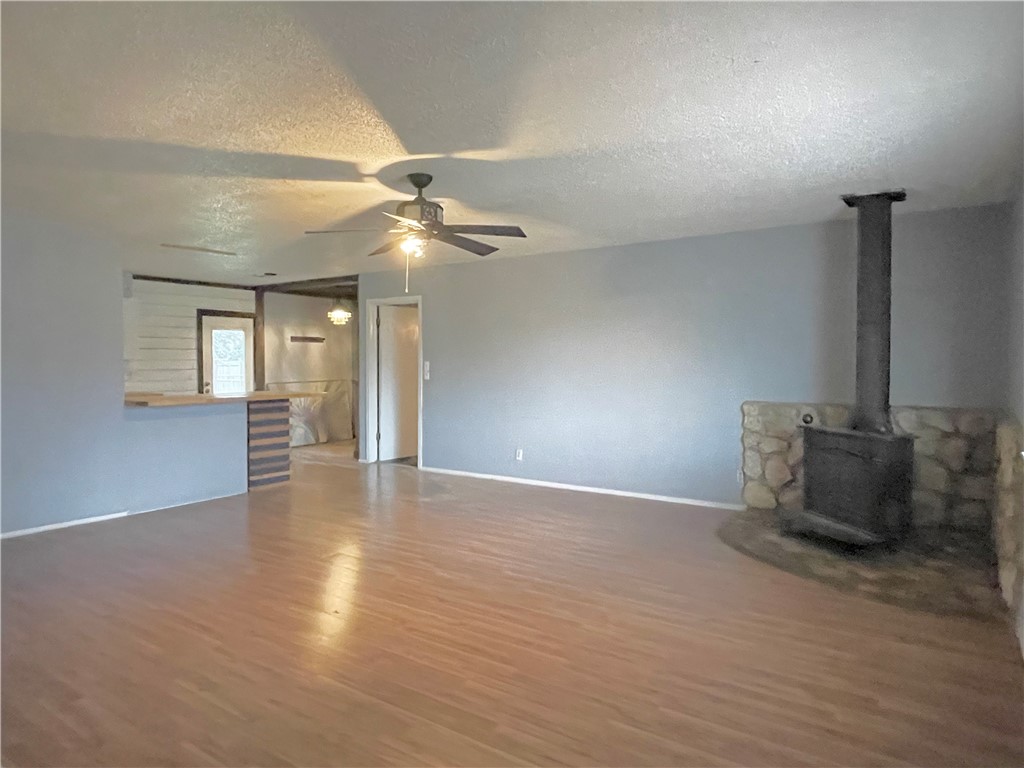 133 Wayman Drive Whitney, TX 76692 - Photo 8 of 38 a view of livingroom and hardwood floor