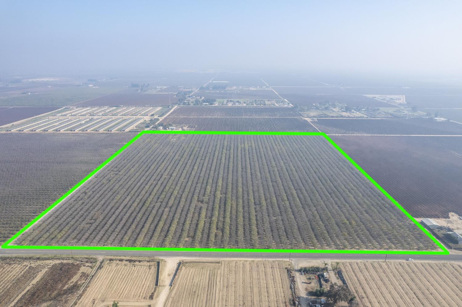 a small yard with an outdoor seating