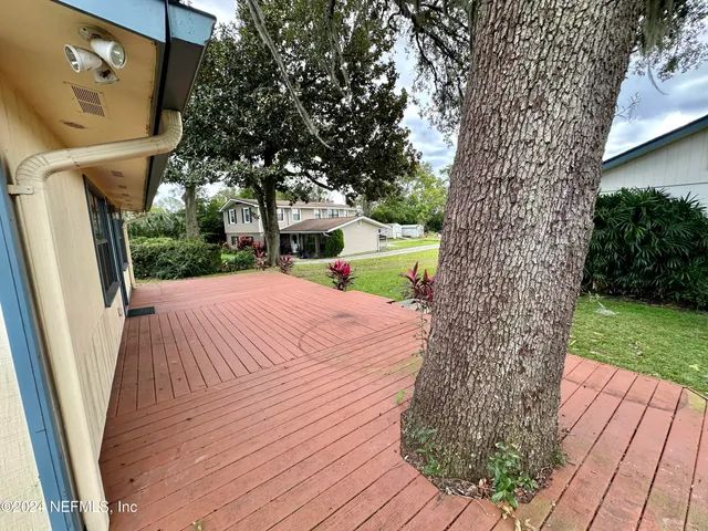 a view of a backyard with a garden