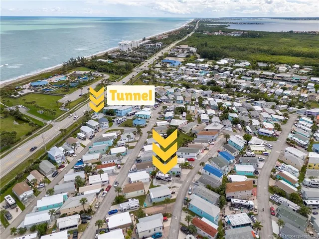 a view of a street with cars