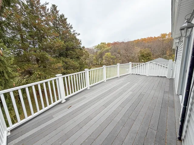 a view of kitchen and wooden floor