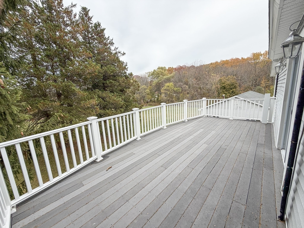 1132 West Boylston Street, Unit 2 Worcester, MA 01606 - Photo 22 of 42 a view of balcony with wooden floor