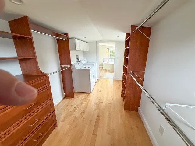 a kitchen with granite countertop a sink and a stove