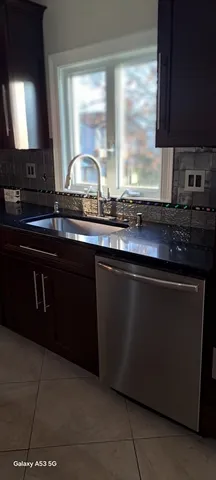 a view of a windows and chandelier in a room