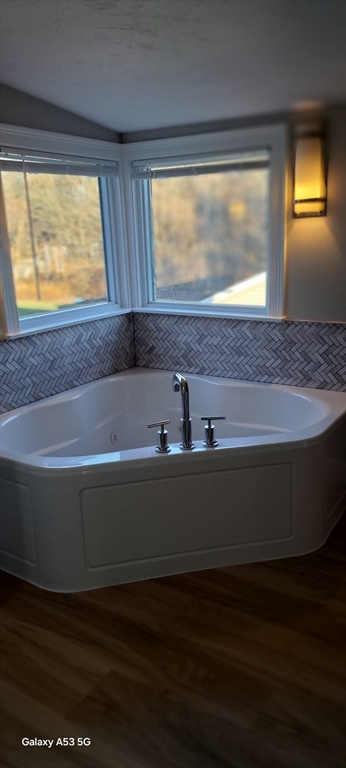 1132 West Boylston Street, Unit 2 Worcester, MA 01606 - Photo 41 of 42 a view of room with window and wooden floor