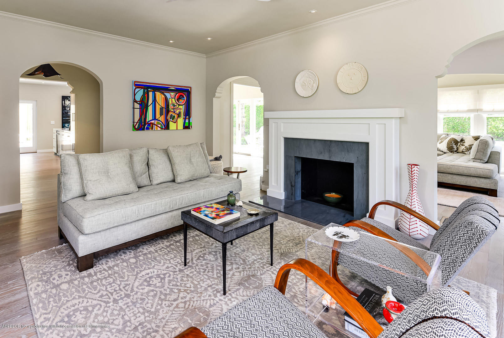 283 Valencia Road West Palm Beach, FL 33401 - Photo 2 of 23 a living room with furniture and a fireplace