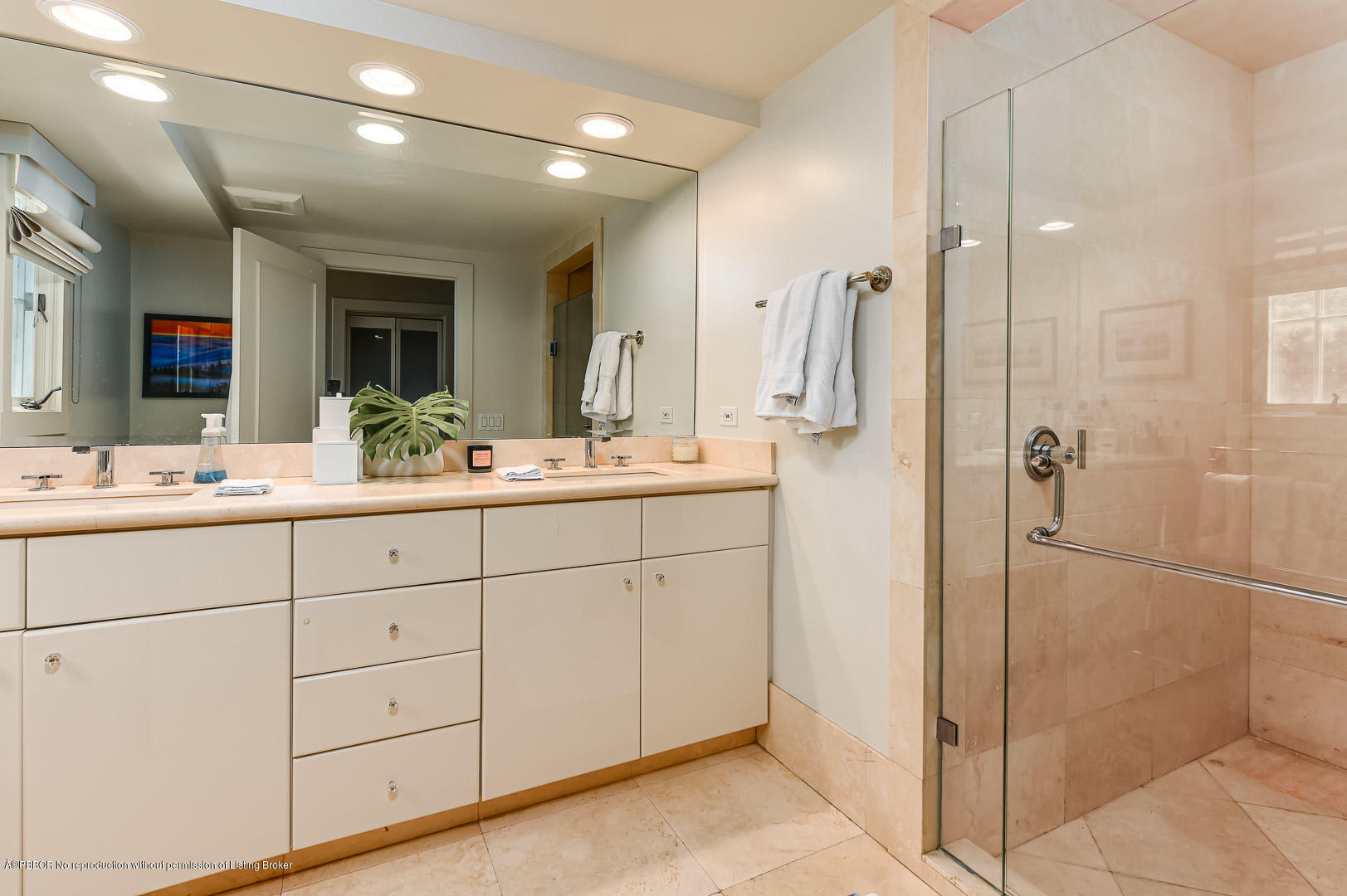 283 Valencia Road West Palm Beach, FL 33401 - Photo 16 of 23 a bathroom with a double vanity sink mirror and shower