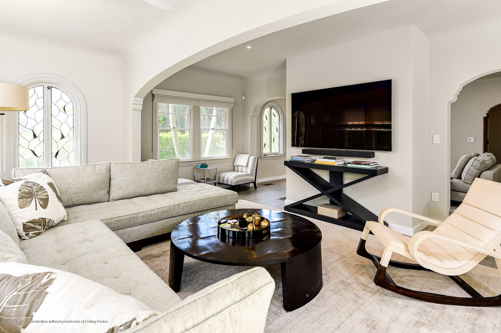 283 Valencia Road West Palm Beach, FL 33401 - Photo 4 of 23 a living room with furniture and a flat screen tv