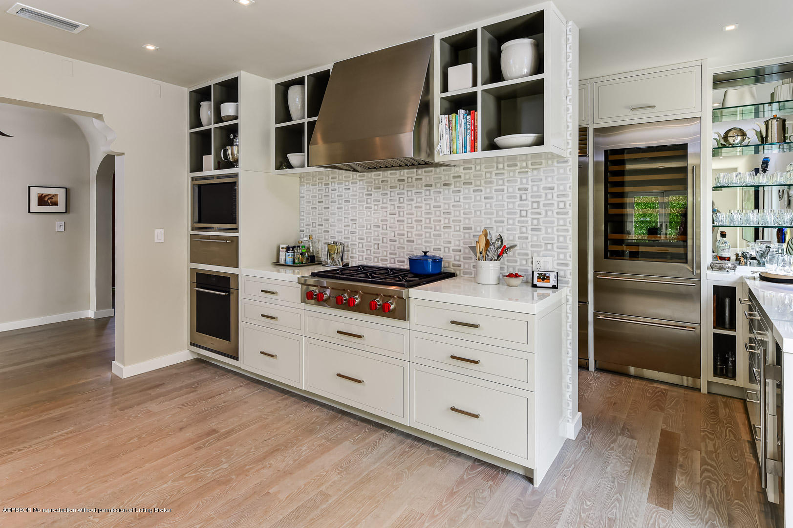 283 Valencia Road West Palm Beach, FL 33401 - Photo 6 of 23 a kitchen with stainless steel appliances a cabinets and wooden floor