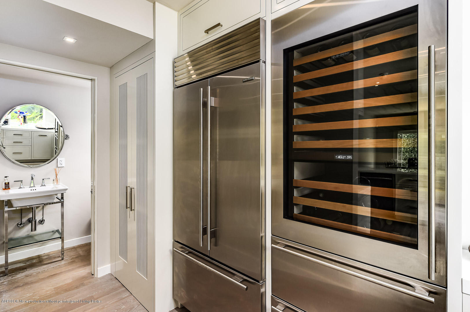 283 Valencia Road West Palm Beach, FL 33401 - Photo 8 of 23 a kitchen with a refrigerator and a stove