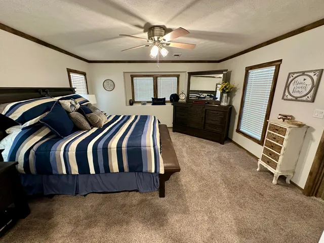 a kitchen with a table and chairs