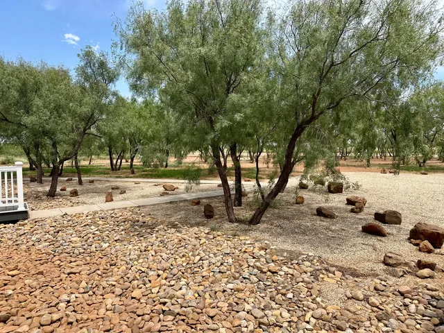 a view of a terrace next to a lake