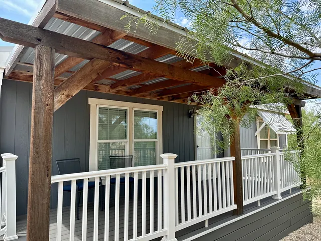a bathroom with a sink a toilet and a shower