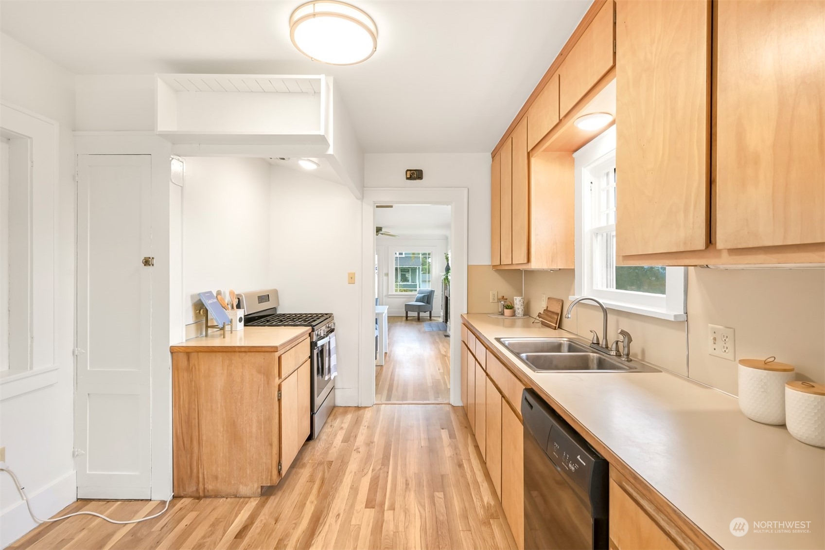 914 Mason Street Bellingham, WA 98225 - Photo 15 of 40 a kitchen with stainless steel appliances granite countertop sink stove and refrigerator
