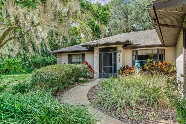 front view of a house with a small yard