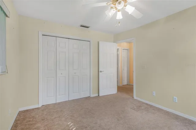 a front view of a house with a yard table and chairs