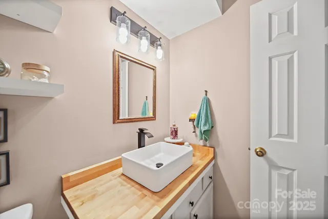 a view of a storage & utility room with a washer dryer