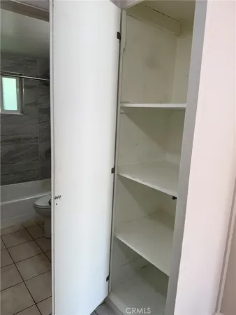 a bathroom with a vanity and toilet