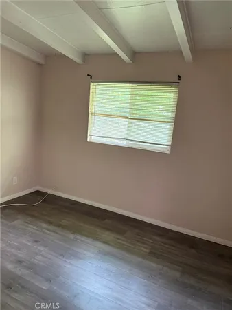 a bathroom with a shower and a toilet