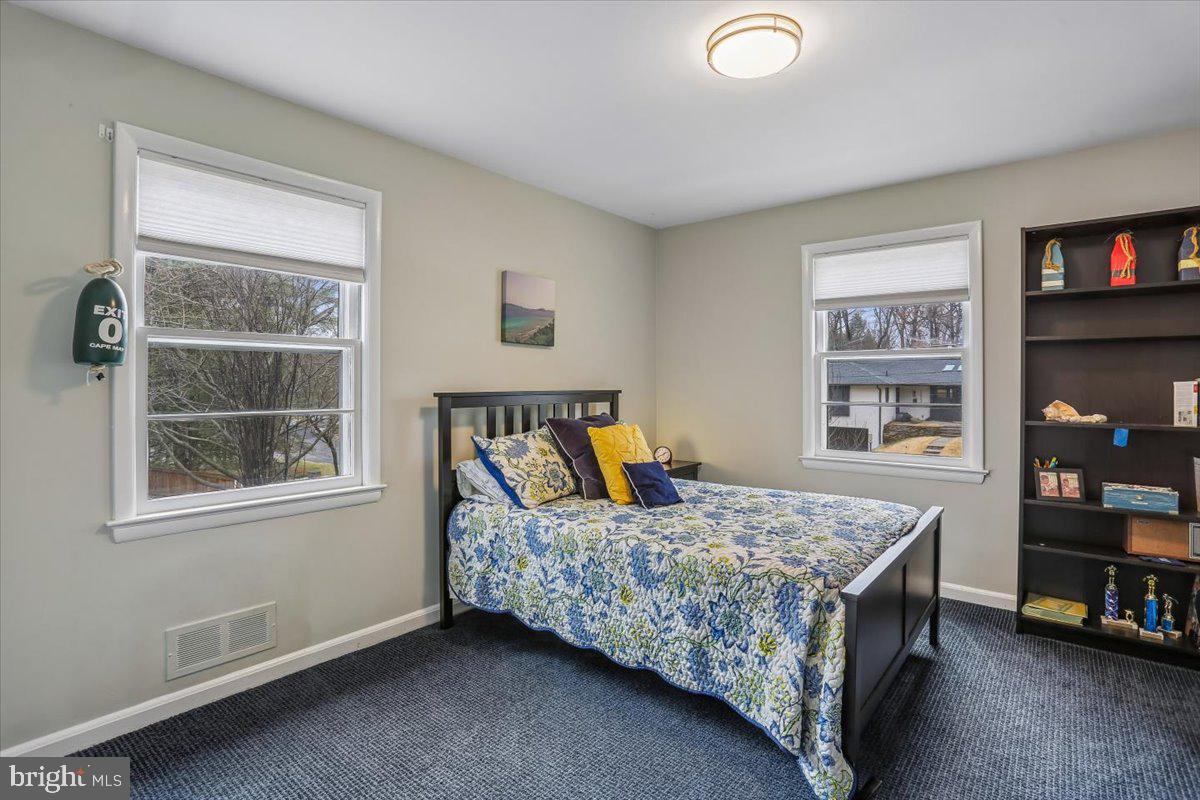 3612 Littledale Road Kensington, MD 20895 - Photo 40 of 79 a bedroom with a bed and a window