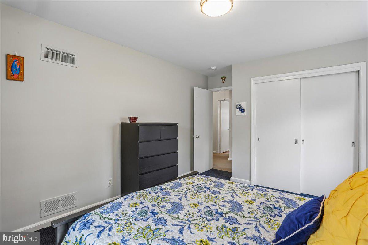 3612 Littledale Road Kensington, MD 20895 - Photo 41 of 79 a bedroom with a bed and a cabinets