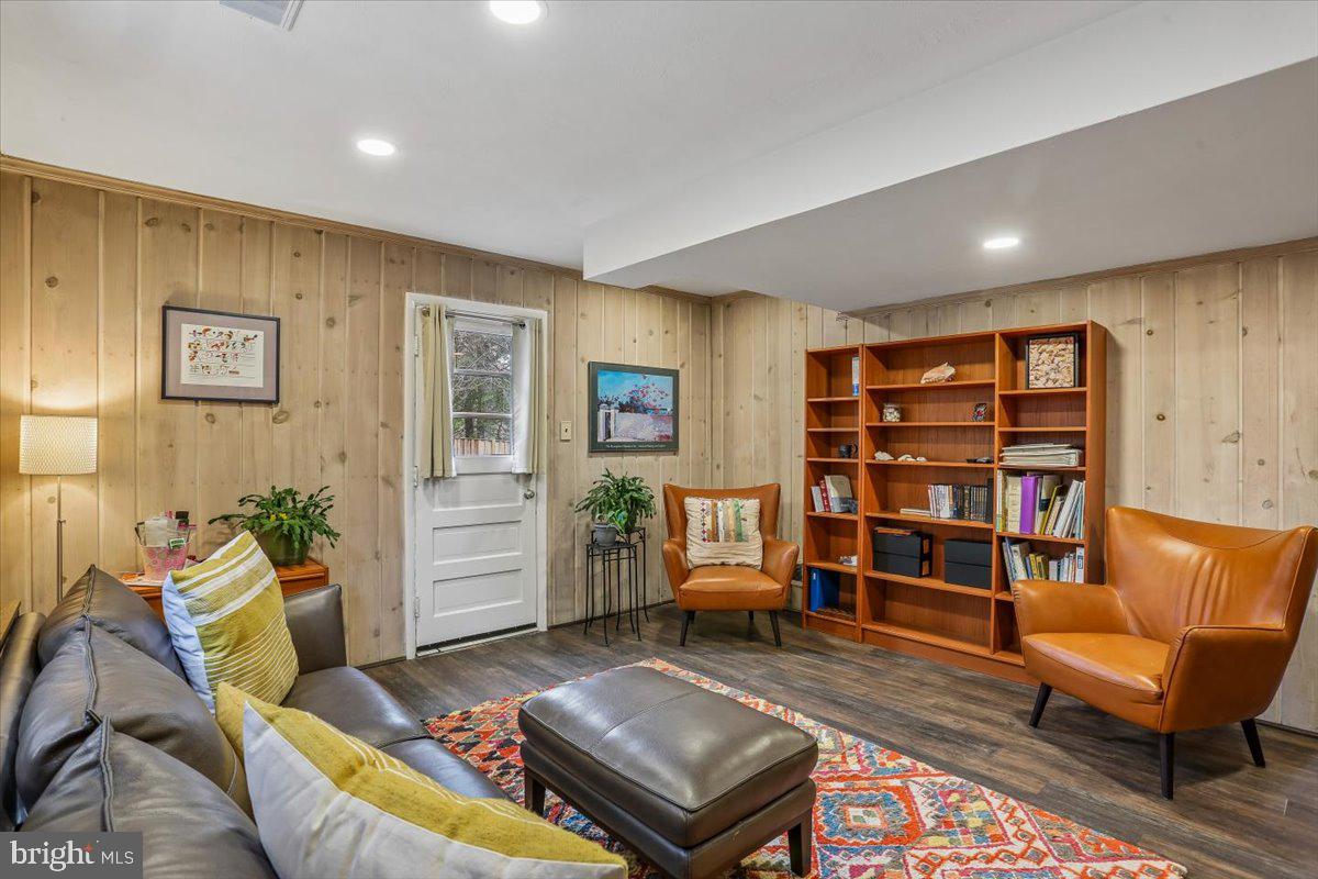 3612 Littledale Road Kensington, MD 20895 - Photo 52 of 79 a living room with furniture and a bookshelf