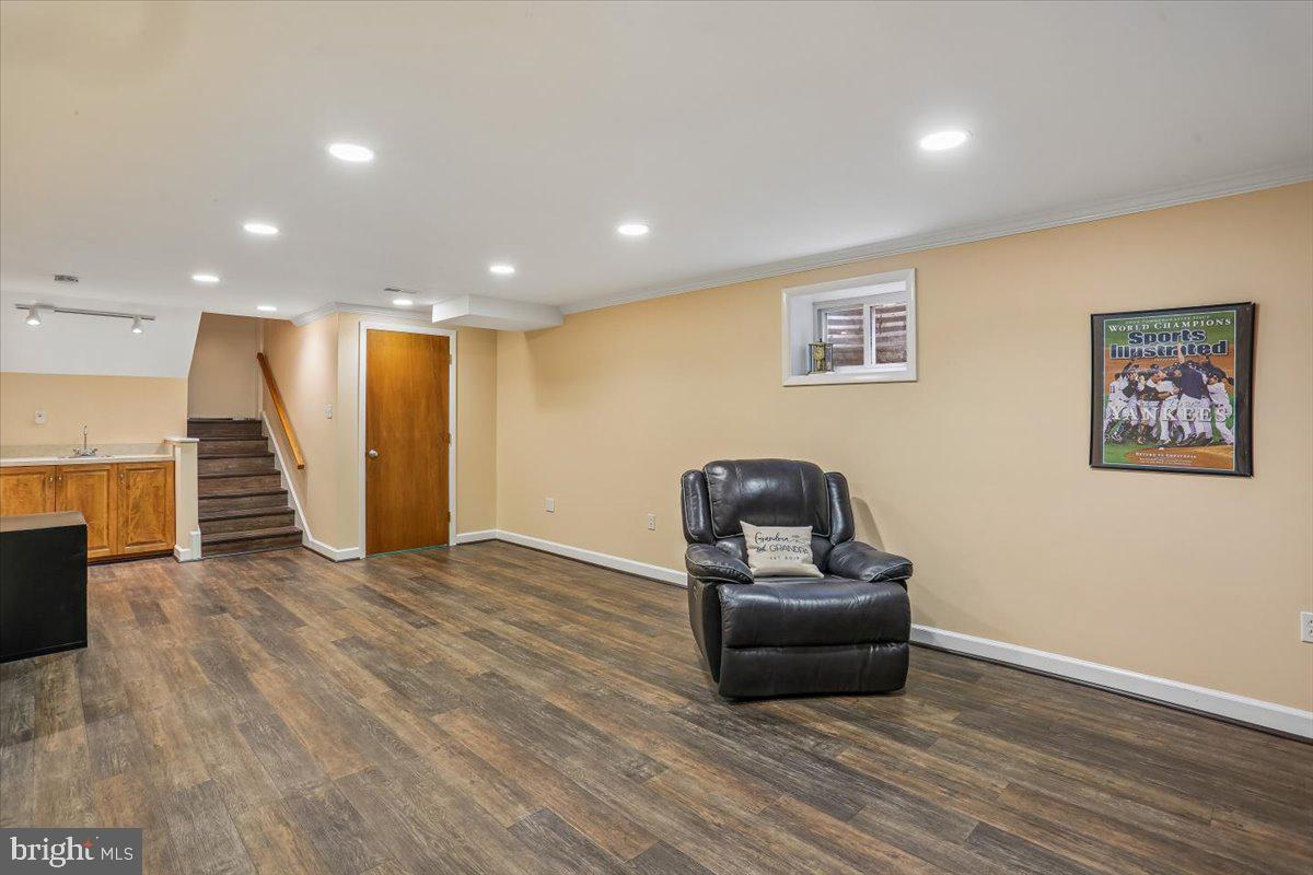 3612 Littledale Road Kensington, MD 20895 - Photo 63 of 79 a view of a livingroom with furniture and wooden floor